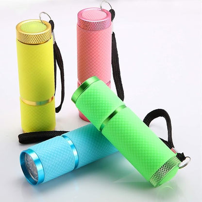 8 Pieces Glow in Dark Flashlights 9 LED Rubber Coated Flashlights with Handle Mini Torch LED Fluorescent Flashlight Aluminum Portable Handy Flashlight for Party Hiking Camping in 4 Colors