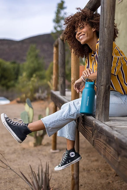 LifeStraw Go Series — Insulated Stainless Steel Water Filter Bottle for Travel and Everyday Use Removes Bacteria, Parasites and Microplastics, Improves Taste, 1L Nordic Noir