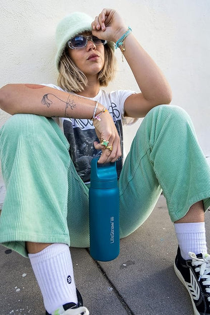 LifeStraw Go Series – Insulated Stainless Steel Water Filter Bottle for Travel and Everyday use removes Bacteria, parasites and microplastics, Improves Taste, 24oz Laguna Teal