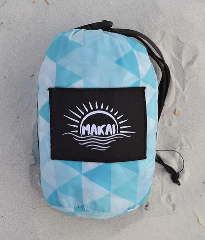 Makai – Lightweight Sheet Style Beach Blanket, Sand Dosen't Stick, Extra Large 8’ x 9’, Compact Strong Parachute Nylon Beach Mat, Stays Cool, Quick Drying, Multifunctional